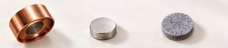 A copper knob shell, a disc magnet and a felt contact pad.